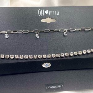 jewelry set from the brand OH❤HELLO features three distinct silver-toned chokers